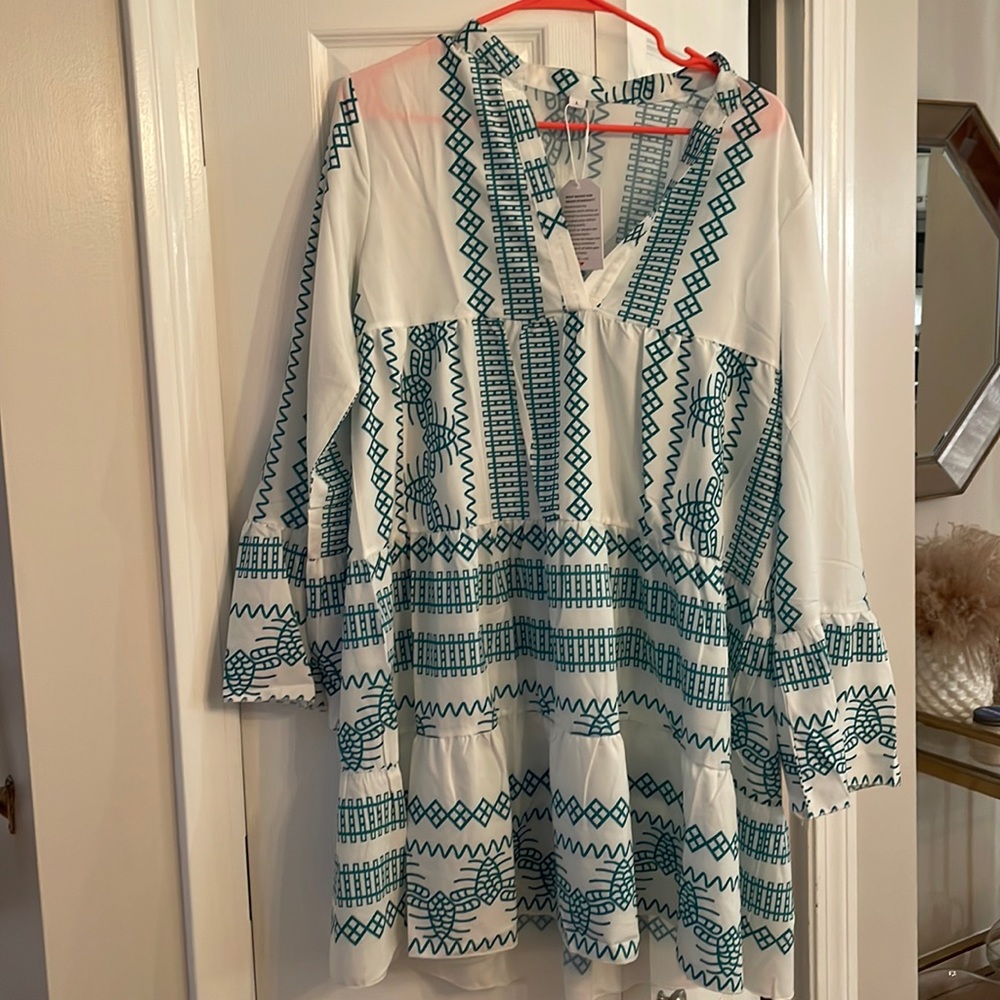 Grildia dress,bell sleeves,polyester,size lg,never been worn w/tag.